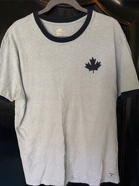 Roots Light Blue Ringer Tee with Navy Maple Leaf